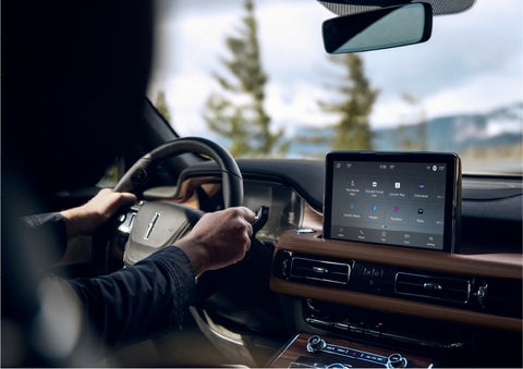 The center touch screen in a 2023 Lincoln Aviator® SUV is shown | John Vance Auto Group in Guthrie OK
