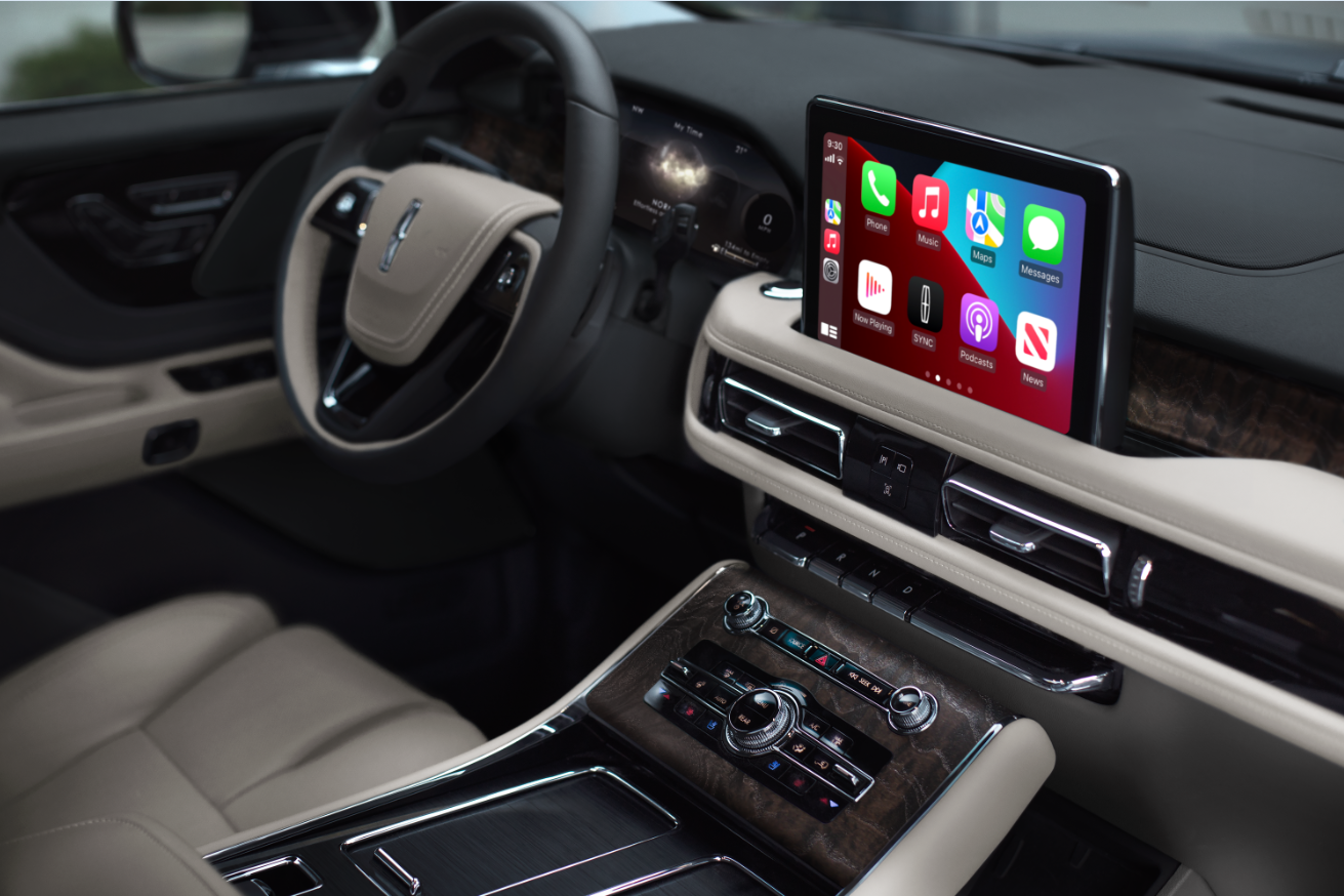 The interior of a Lincoln Aviator® SUV is shown with emphasis on the center touchscreen | John Vance Auto Group in Guthrie OK