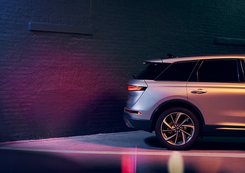 A 2023 Lincoln Corsair® SUV is shown backing up toward a wall. | John Vance Auto Group in Guthrie OK