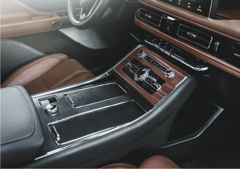 The front center console of a 2023 Lincoln Aviator® SUV is shown | John Vance Auto Group in Guthrie OK
