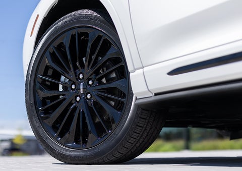 The stylish blacked-out 20-inch wheels from the available Jet Appearance Package are shown. | John Vance Auto Group in Guthrie OK