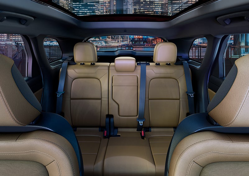 The spaciousness of the second row of the 2023 Lincoln Corsair® SUV is shown. | John Vance Auto Group in Guthrie OK